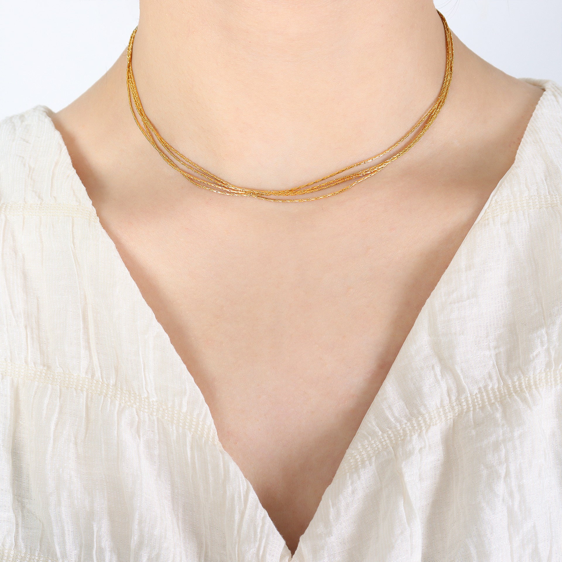 GLIMMER MULTI LAYERED NECKLACE